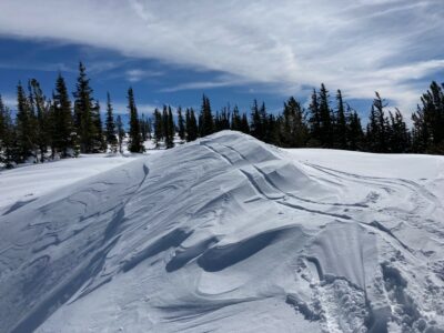 Feb 26, 2022: Evidence of north winds, this gully faces north and this drift of snow is from north winds stripping snow from the gully and moving it further on the ridgetop