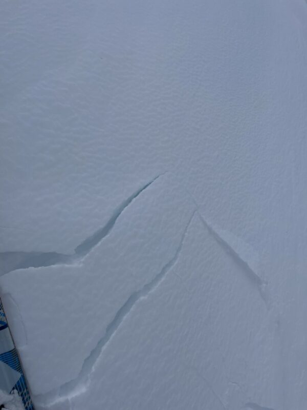 Small wind slab reactive to weight of skier along ridge.