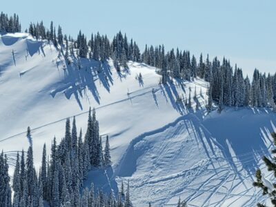 Feb 25, 2023: Snowmobile-triggered avalanche in Poison Bowl on Saturday (02/25).