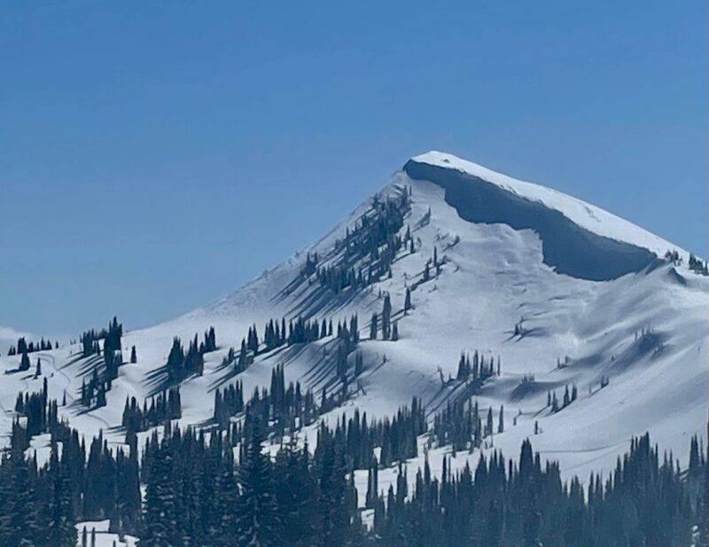 Council Mountains North aspect with a giant cornice lip hanging over that likely grew from strong winds on Tuesday